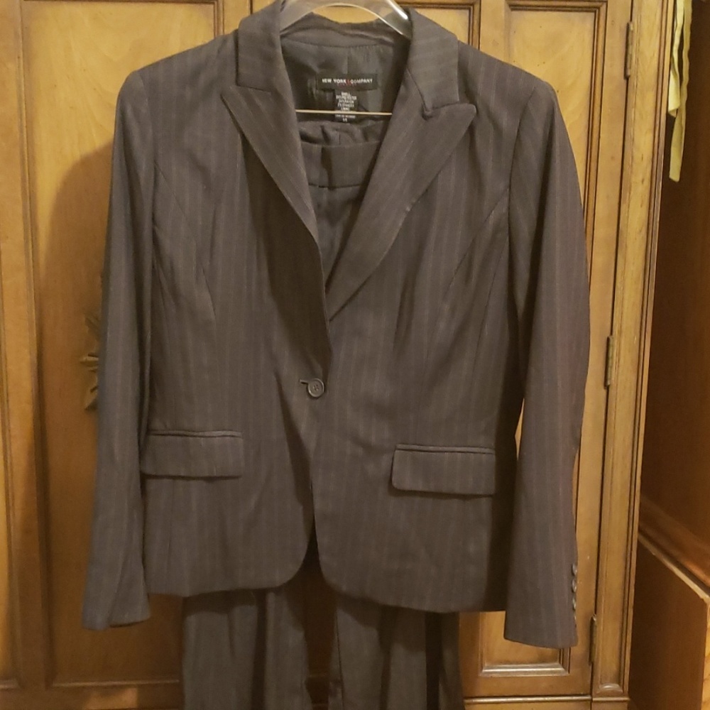 Suit grey charcoal blazer and pants.